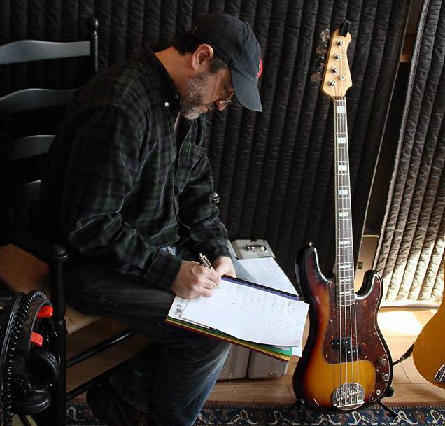 Jon in studio taking notes. Photo: FJ Ventre.